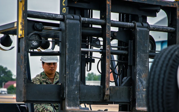 Sailors at VX-1 unload equipment