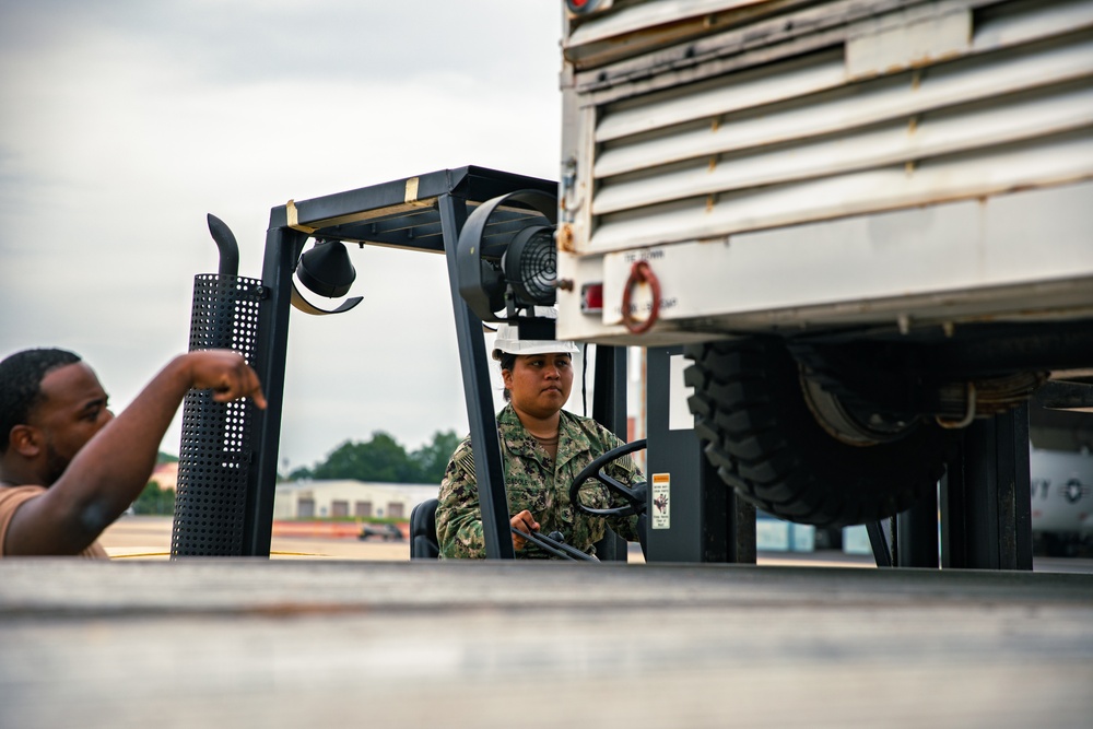 Sailors at VX-1 unload equipment