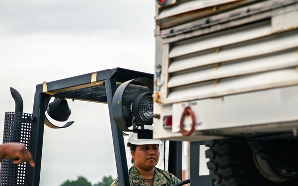 Sailors at VX-1 unload equipment