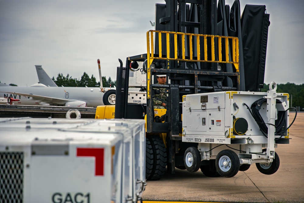 Sailors at VX-1 unload equipment