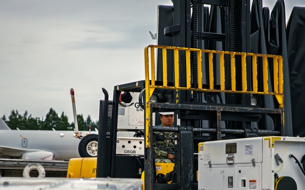 Sailors at VX-1 unload equipment