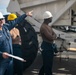 USS Tripoli Performs Crane Maintenance