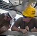 USS Tripoli Performs Crane Maintenance