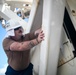 USS Tripoli Performs Crane Maintenance