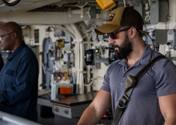 USS Frank Cable (AS 40) departs Puerto Princesa, Philippines