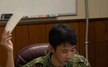 U.S. Marines, Japan Self-Defense Force discuss enemy prisoner of war handling during Resolute Dragon 25