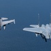 F-15EX Eagle II and F-16D Fighting Falcon fly over the Gulf of America