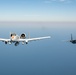 F-15EX Eagle II and A-10C Thunderbolt II fly over the Gulf of America