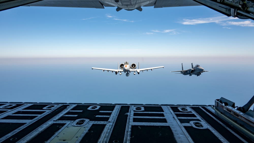 F-15EX Eagle II and F-16D Fighting Falcon fly over the Gulf of America