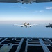 F-15EX Eagle II and F-16D Fighting Falcon fly over the Gulf of America