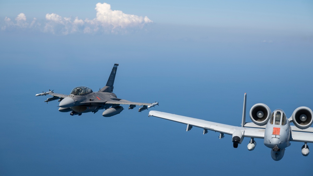 2-ship formation of U.S. Air Force aircraft fly over the Gulf of America