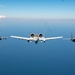 3-ship formation of U.S. Air Force aircraft fly over the Gulf of America