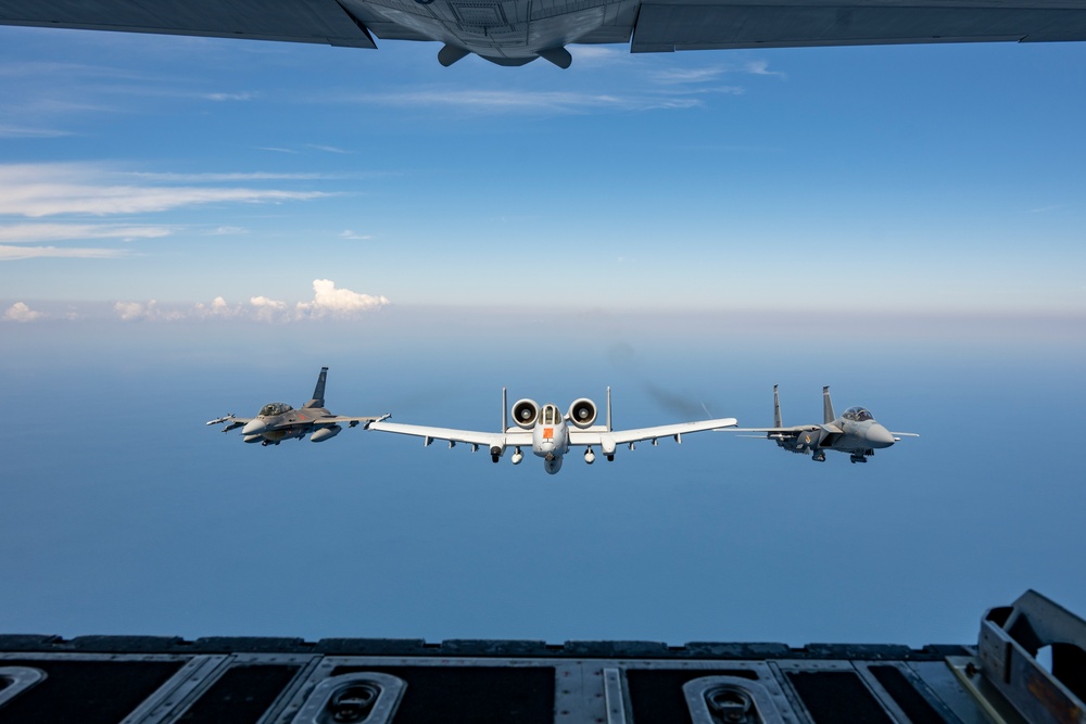 3-ship formation of U.S. Air Force aircraft fly over the Gulf of America