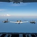 3-ship formation of U.S. Air Force aircraft fly over the Gulf of America