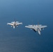 F-15EX Eagle II and F-16D Fighting Falcon fly over the Gulf of America