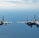 F-15EX Eagle II and F-16D Fighting Falcon fly over the Gulf of America