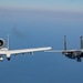 F-15EX Eagle II and A-10C Thunderbolt II fly over the Gulf of America