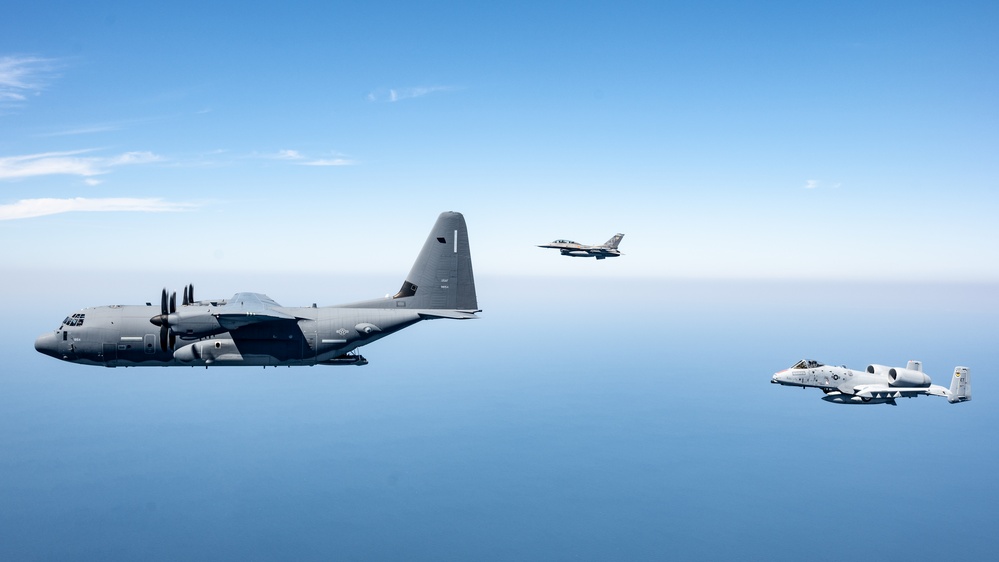 A 3-ship formation of U.S. Air Force aircraft fly over the Gulf of America