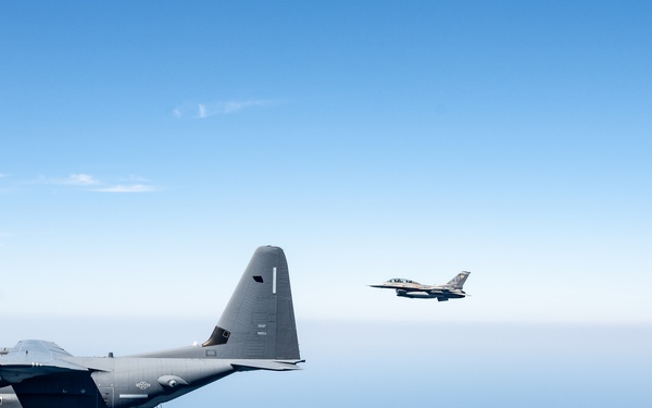 A 3-ship formation of U.S. Air Force aircraft fly over the Gulf of America