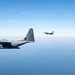 A 3-ship formation of U.S. Air Force aircraft fly over the Gulf of America
