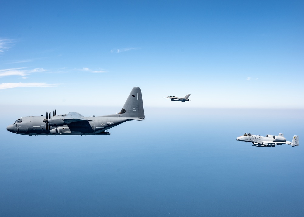 A 3-ship formation of U.S. Air Force aircraft fly over the Gulf of America