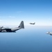 A 3-ship formation of U.S. Air Force aircraft fly over the Gulf of America