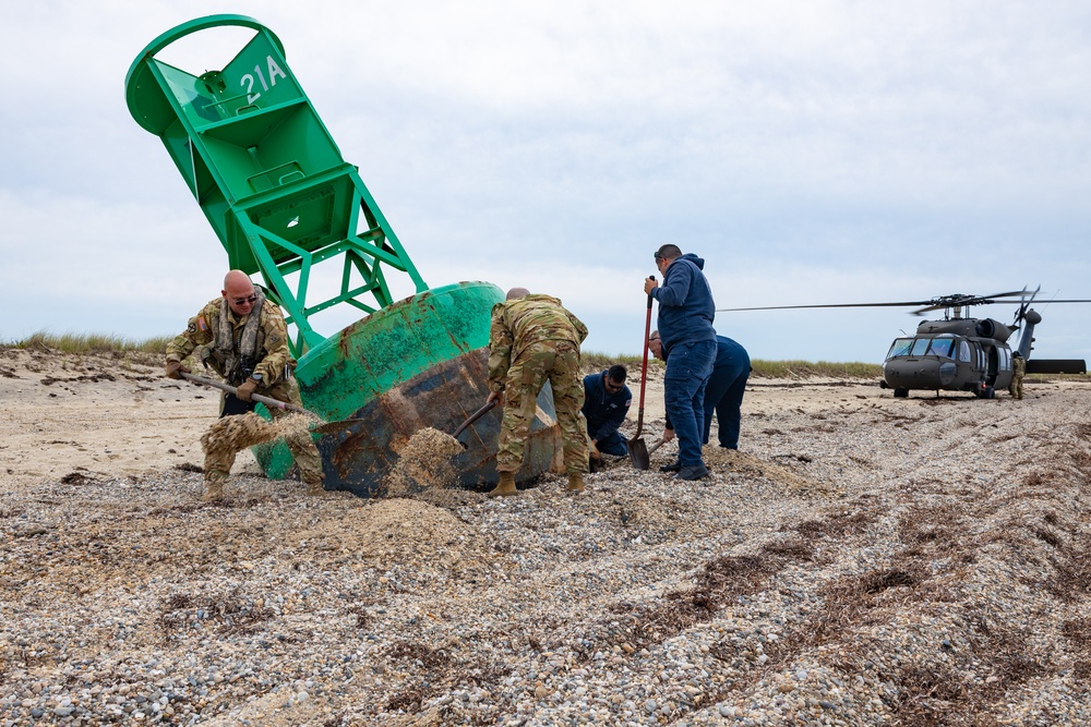 Connecticut Army National Guard partners with Coast Guard to dislodge beached buoy