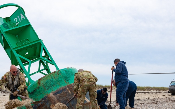 Connecticut Army National Guard partners with Coast Guard to dislodge beached buoy