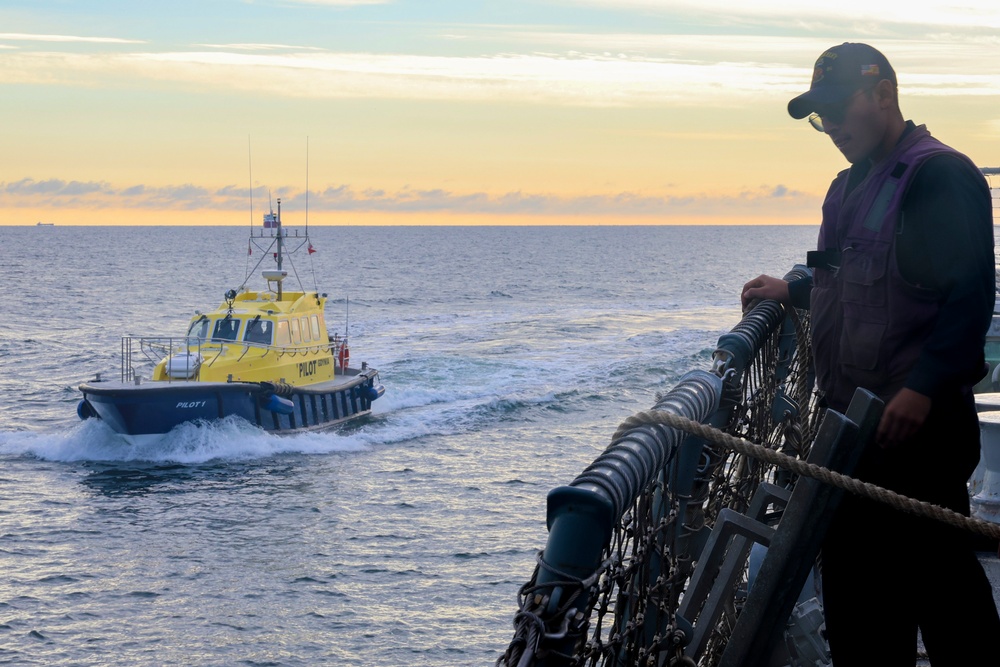 STGSN Nathan Antepara inspects the pilot ladder as part of a sea-and-anchor evolution