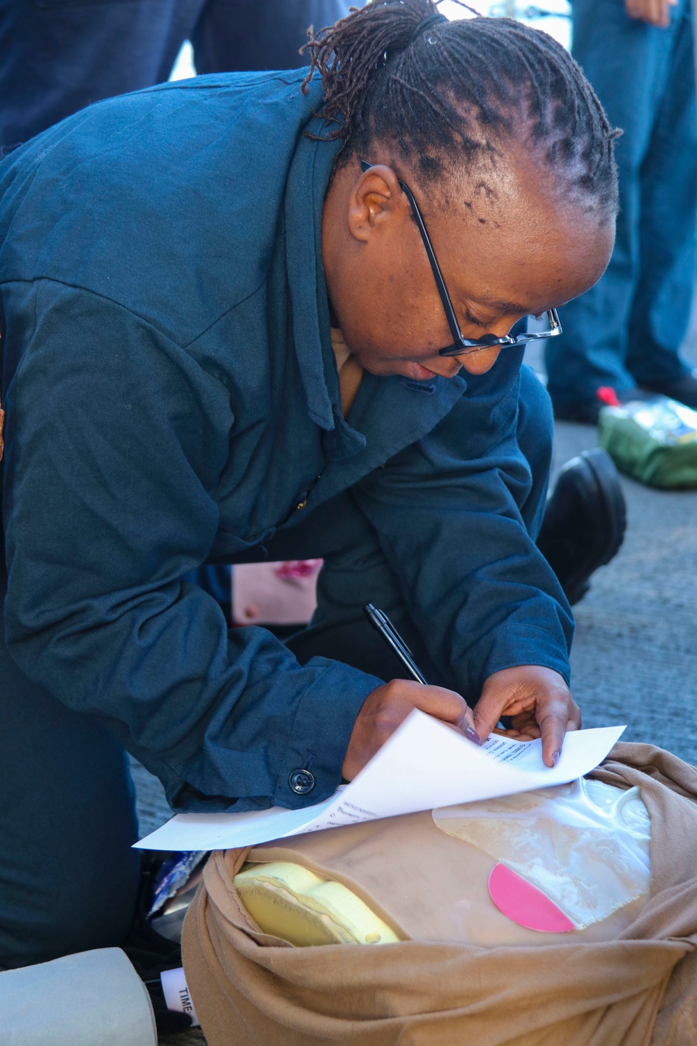 LSSN Tsholofelo Motshwane identifies and records service member information during a simulated mass casualty drill LSSN Tsholofelo Motshwane identifies and records service member information during a simulated mass casualty drill