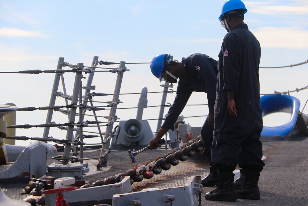 BM3 Carlens Milice and BMSA Dewan Henry hit the last shot on the anchor chain BM3 Carlens Milice and BMSA Dewan Henry hit the last shot on the anchor chain
