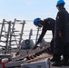 BM3 Carlens Milice and BMSA Dewan Henry hit the last shot on the anchor chain
