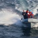 USS Bulkeley (DDG 84) Sailors return to ship on a rigid hulled inflatable boat