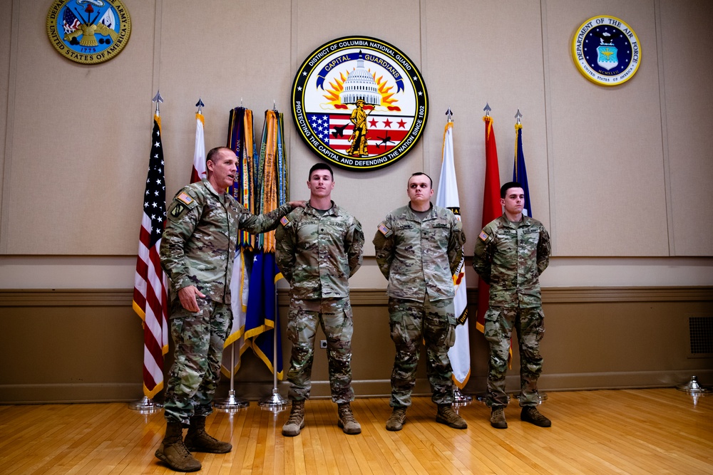 Senior Enlisted Advisor John Raines, SEA to the Chief, National Guard Bureau, recognizing Soldiers from Joint Task Force District of Columbia