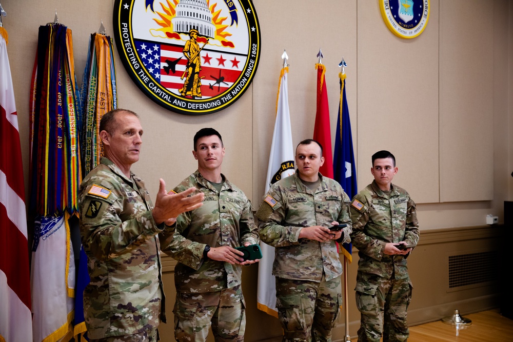 Senior Enlisted Advisor John Raines, SEA to the Chief, National Guard Bureau, recognizing Soldiers from Joint Task Force District of Columbia