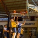 USS Frank Cable (AS 40) Sailors participate in a basketball game with Philippine sailors