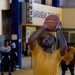 USS Frank Cable (AS 40) Sailors participate in a basketball game with Philippine sailors