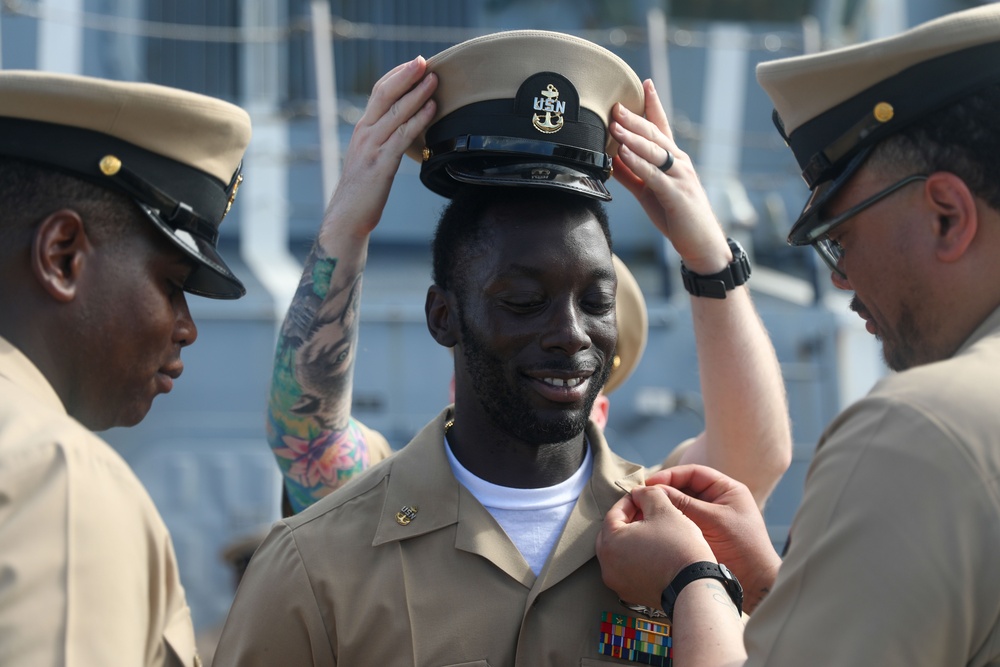 Sailors aboard the USS John Finn hold a chief petty officer pinning ceremony in the South China Sea