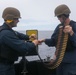 Sailors aboard the USS John Finn conduct a gun shoot in the South China Sea