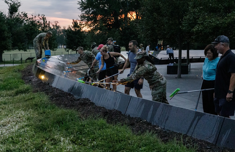 Civilians and Military work together to honor the fallen