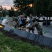 Civilians and Military work together to honor the fallen