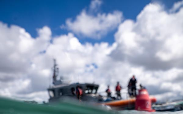 U.S. Coast Guard divers maintain aids to navigation