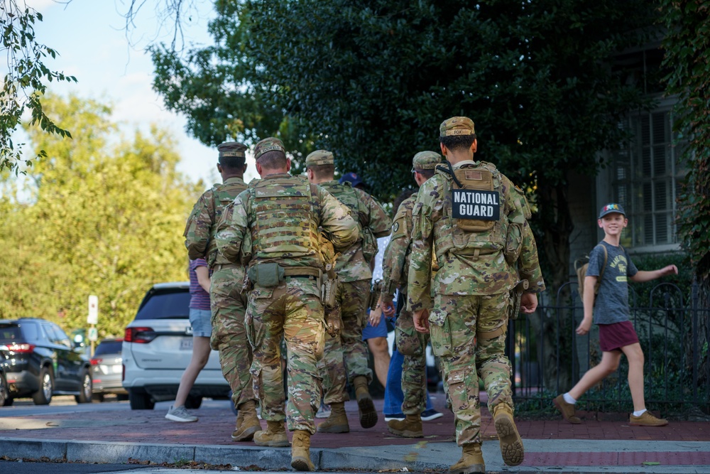 South Carolina Army National Guardsmen patrol with Guardsmen from the Georgia National Guard