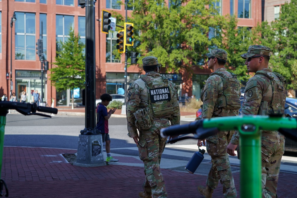 South Carolina Army National Guardsmen patrol with Guardsmen from the Georgia National Guard