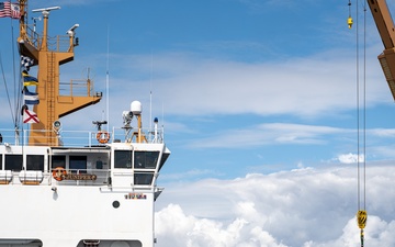 U.S. Coast Guard Cutter Juniper conducts maintenance on channel buoys