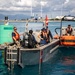 U.S. Coast Guard Cutter Juniper conducts maintenance on channel buoys
