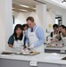 Members of 403rd AFSB took part in a samgyetang cooking class