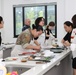 Members of 403rd AFSB took part in a samgyetang cooking class
