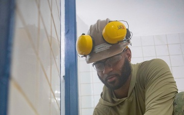 Naval Mobile Construction Battalion Four performs repairs on Aimeliik Elementary School in support of Pacific Partnership 2025