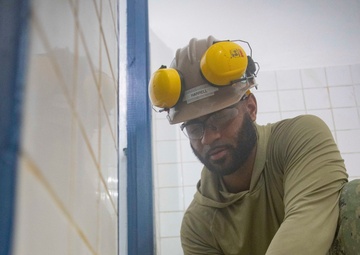 Naval Mobile Construction Battalion Four performs repairs on Aimeliik Elementary School in support of Pacific Partnership 2025